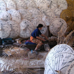 umbrellaWorker photo by Joan-Santos